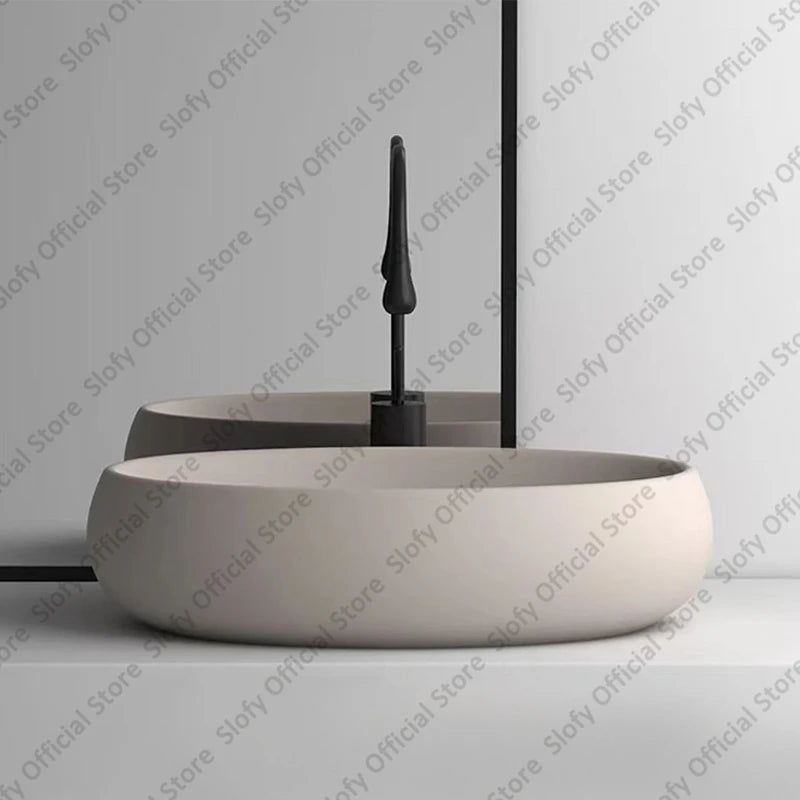 Simple Oval Ceramic Countertop Basin – Modern Luxury Bathroom Sink