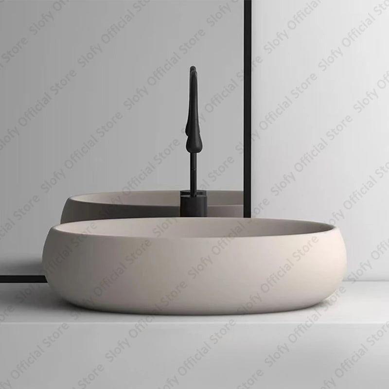 Simple Oval Ceramic Countertop Basin – Modern Luxury Bathroom Sink