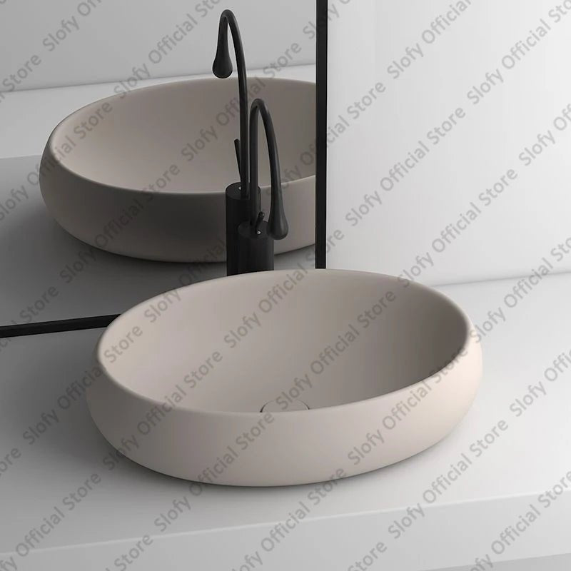 Simple Oval Ceramic Countertop Basin – Modern Luxury Bathroom Sink