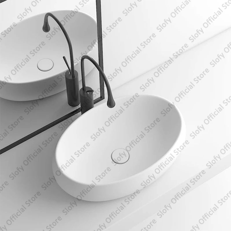 Simple Oval Ceramic Countertop Basin – Modern Luxury Bathroom Sink